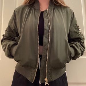 Super cute green bomber jacket!